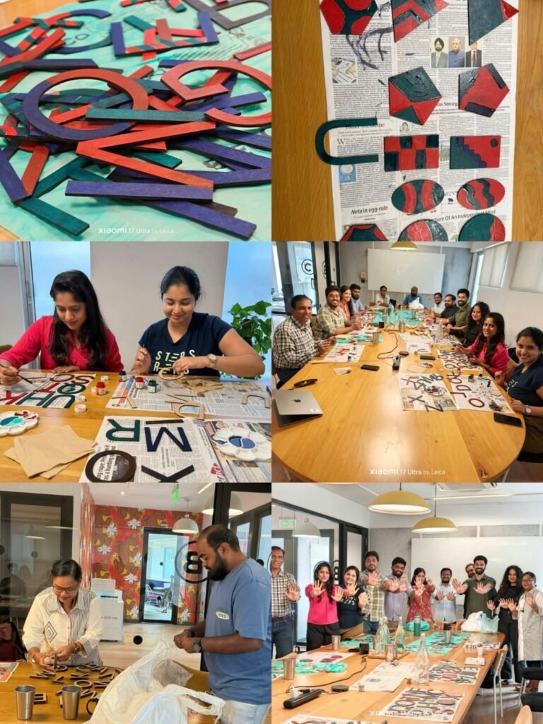 Zendesk volunteers painting educational learning aids during the Letters of Learning initiative with Kritagyata Trust